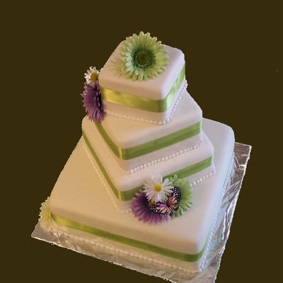 Four Tier Square With Marshmallow Fondant And Gerber Daisies