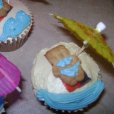 Teddy Graham Sunbathing On Cupcake