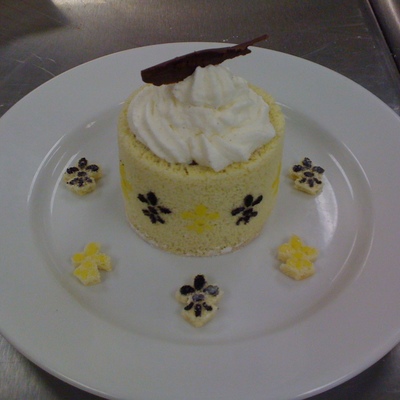 Fleur De Lis Cake Wrapped Around Chocolate Bavarian