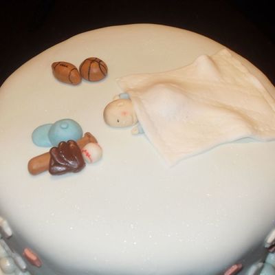 Sleeping Baby On Sports Theme Cake