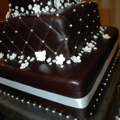 Black Cake With Flowers And Butterflies