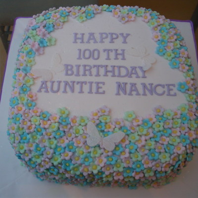 100Th Birthday Cake Covered In Flowers