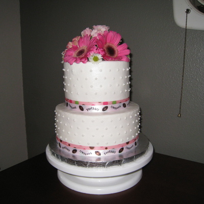 A Traditional Wedding Cake For A Football Fan