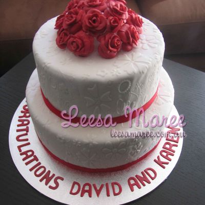 Two Tier White Fondant Cake With Roses