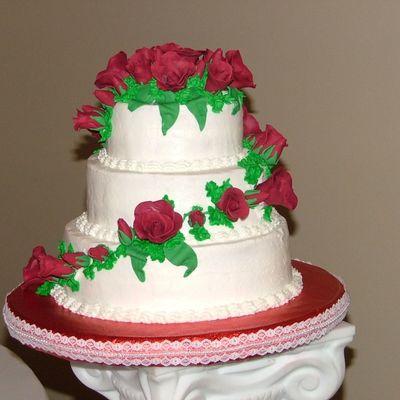 White Cake With Buttercream Frosting With Handmade Apple Color Roses