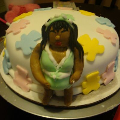 Pregnant Lady Leaning On Cake