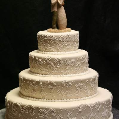 Ivory And White Wedding Cake With Scroll Work