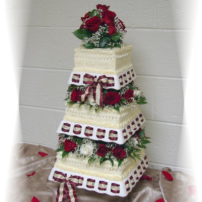 Square 3 Tier Buttercream With Fresh Roses And Ribbon.