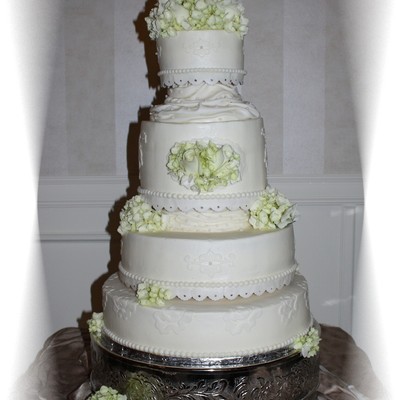 Ivory Buttercream With Fondant Accents. Fresh Hydrangea And Roses.
