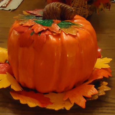Pumpkin Cake With Fall Leaves.