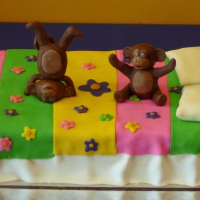 Monkeys On The Bed