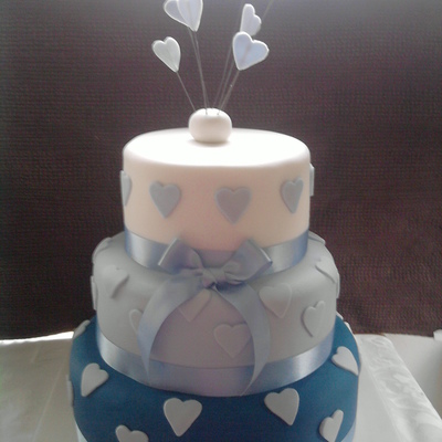Blue And White Three Tier Cake With Hearts