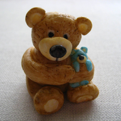 Henry The Bear Holding His Teddy