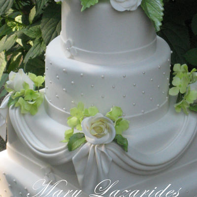 White Wedding Cake With Sugarpaste Roses And Hydrangeas