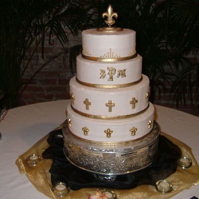 Gold Fleur De Lis And Crosses Wedding Cake
