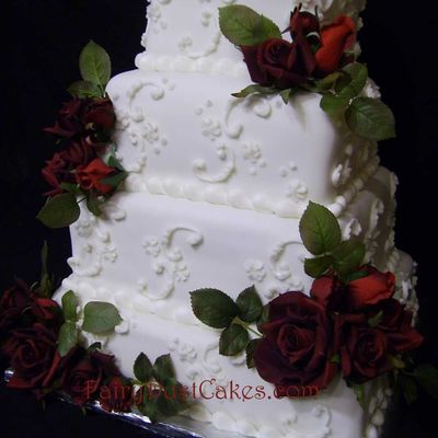 Square Wedding Cake With Scrolls And Silk Flowers