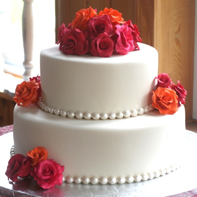 Orange, Red And Pink Rose Wedding Cake