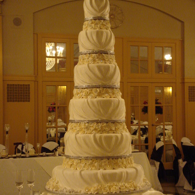 Buttercream Draped Six Tier Wedding Cake