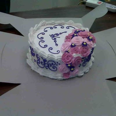 Purple And White Cake With Pink Roses