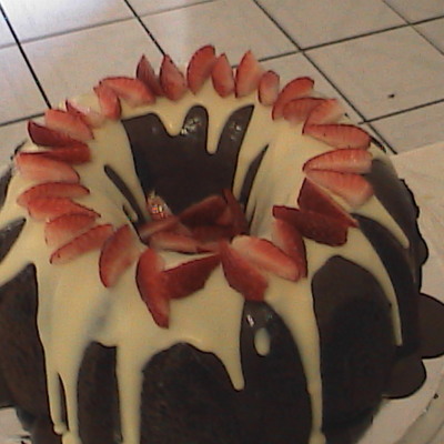 Fudgy Chocolate Cake With Strawberries.