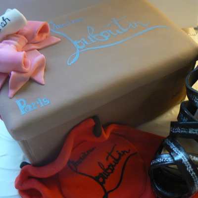 A Designer Shoe And Box