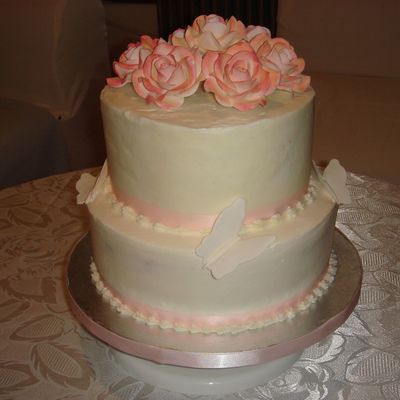 Buttercream Wedding Cake With Gum Paste Roses And Butterflies.