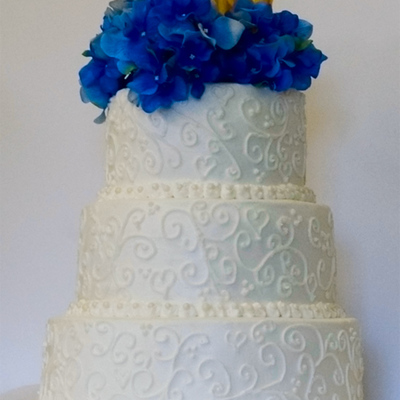White Wedding Cake With Scrolls