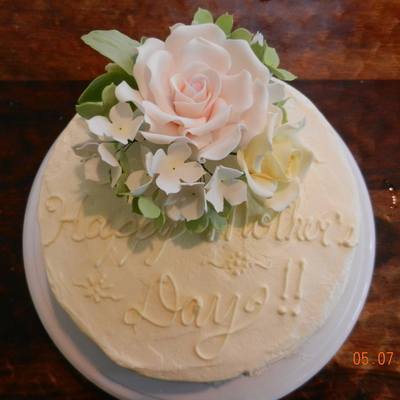 A Cake And Sweet Bouquet For Mother