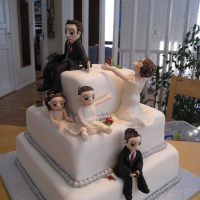 Bride Groom And Kids On A Cake