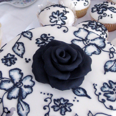 Cutting Cake And Matching Cupcakes