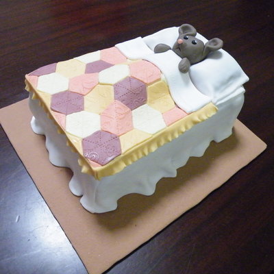 Mouse In Bed With Patchwork Blanket