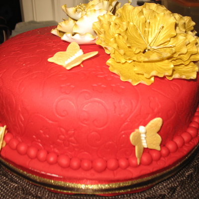 Red And Gold Wedding Cutting Cake