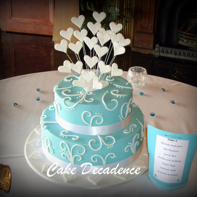 Teal Scroll & Hearts Wedding Cake