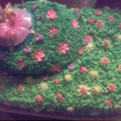 Tinkerbell Floating Over Her Garden