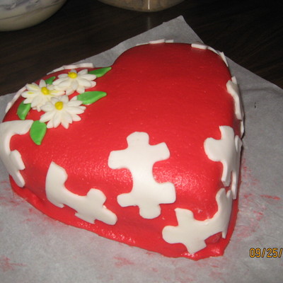 Heart Cake With Puzzle Pieces And Daisies.