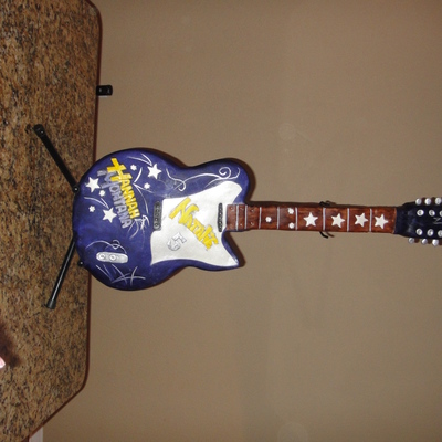 Hannah Montana Guitar Cake On A Guitar Stand