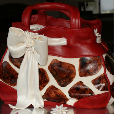 Red Giraffe Purse Cake
