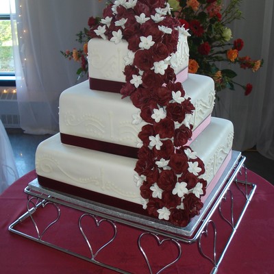 Three-Tier Square Wedding Cake With Burgundy Roses