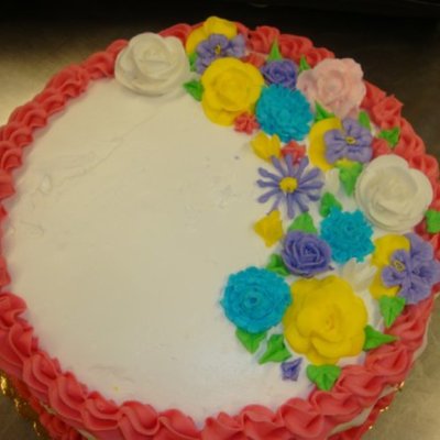Yellow Buttercream Cake With Royal Icing Flowers