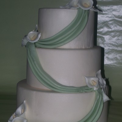 Green Drapes And Calla Lillies