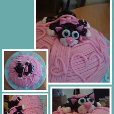 Cat On A Ball Of Yarn