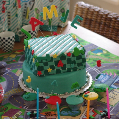 Race Car Cake And Cupcakes Blue And Green Checkered