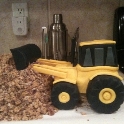 Tractor And Dirt Pile