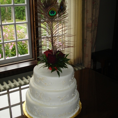 Victorian Cake With Peacock Feather Topper