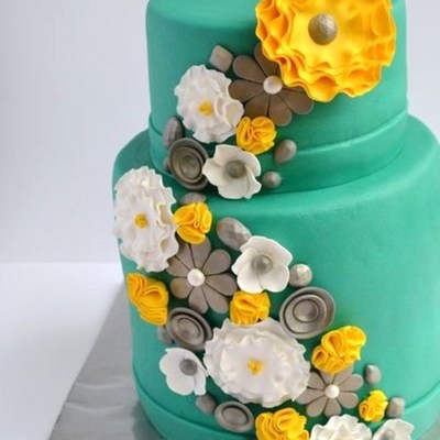 Teal With A Bright Yellow Flower!