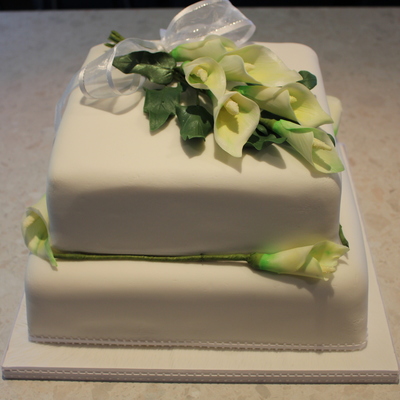 2 Tier White Wedding Cake With Lillies
