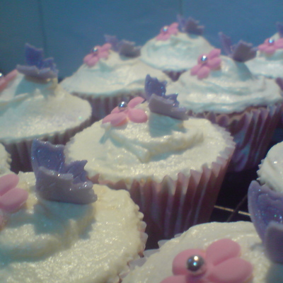Lemon Cupcakes Decorated With Butterfly And Flower