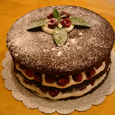 Chocolate Cake With Whipped Cream And Fresh Raspberries