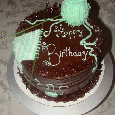 Knitting Needles And Ball Of Yarn