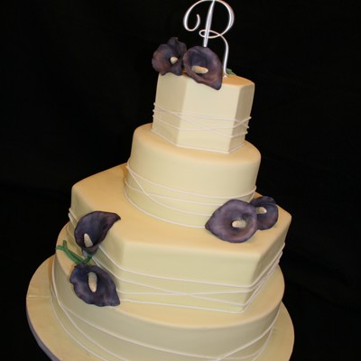 Yellow Wedding Cake With Purple Lilies
